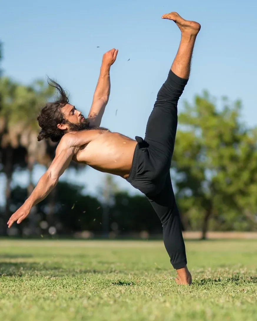 Standing kick in a park